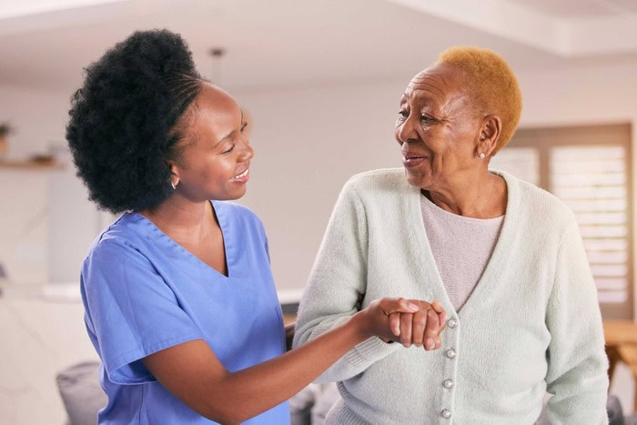 A Home Health Aid Lending a Hand